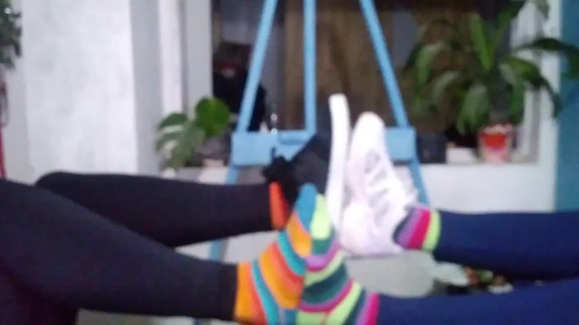 Two Girls Comparing SHOES ans SOCKS