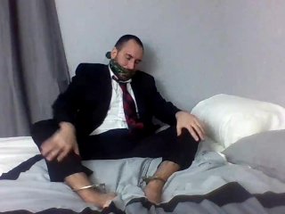 Gagged And Showing Off In A Suit