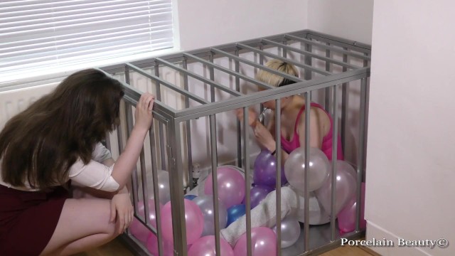 Caged Slave Girl Blows Up Balloons - Porcelain Beauty