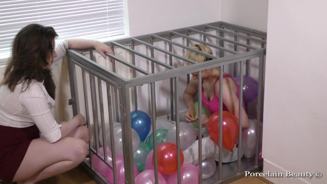 Caged Slave Girl Blows Up Balloons - Porcelain Beauty