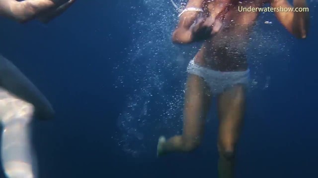 Naked girls on Tenerife having fun in the water