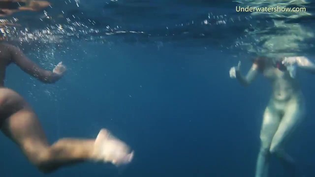 Naked girls on Tenerife having fun in the water