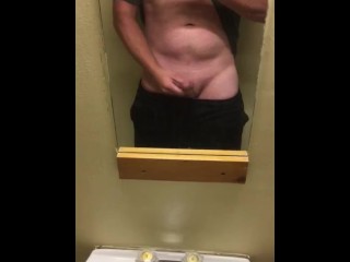Horny while camping, I escape to a public washroom in the campground to go jerk off and Cum.