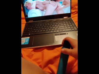 Watching lesbian porn while masturbatingmy wet pussy