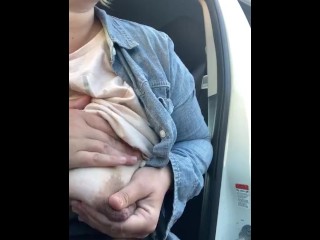 Milkymama talks to a fan while squirting milk in_public