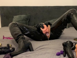 Catwoman shows, rides and makes blowjob on her favorite toys_in latex catsuit and bootsLATEX FETISH