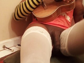 Shemale Playing Music On Ukulele