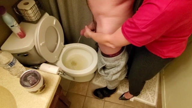Helping my neighbor by holding his dick while he pees in the toilet while my boyfriends at work 12