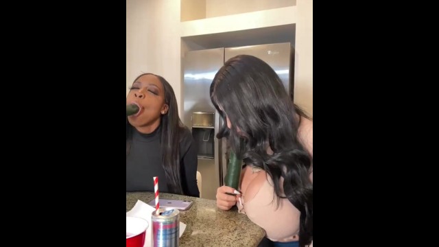 Latina Bimbo and Ebony Goddess Suck Cucumbers 