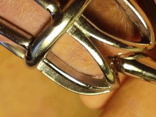 Macro view when urethral sounding for locked in chastity  cage cock.