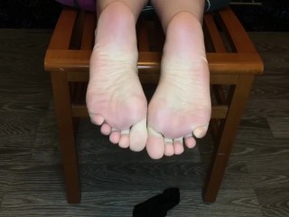 Screen Capture of Video Titled: Teen show her black ped nylon socks foot fetish