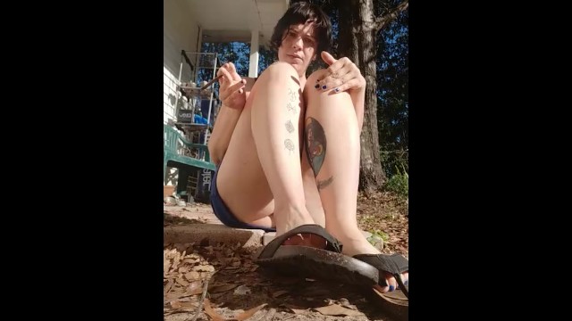 Takes thong sandals off and shows off toes and soles 20