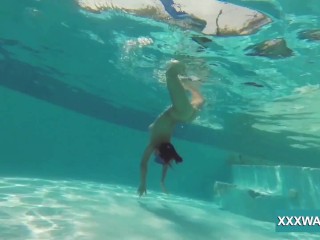 Hot brunette slutCandy swims underwater