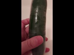 Fucked with a condom covered cucumber (repost)