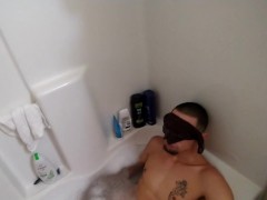 Huge cock gets snuck up on and milked in the bathtub