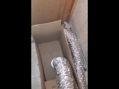 The drier hose tries to blow the box