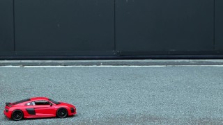 Crush of Red Audi R8 model toy car with Black Pump Stilettos