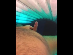 Rubbing one out in tanning bed