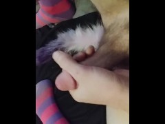 Horny slut in knee highs with a plug tail cums closeup