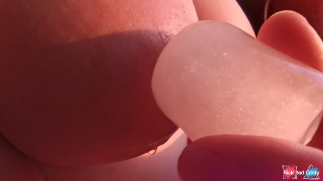 Beautiful erotica! Playing with my big titties nipples with an ice cube at sunset. 2