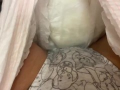 Peeing in panties inside a diaper