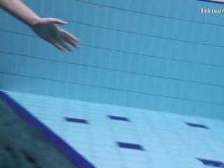 Andrejka and Aneta swim naked in_the swimming pool