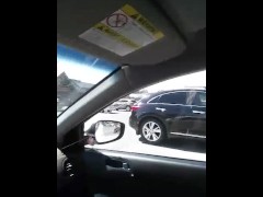  Milf  car mastrubates in busy parking lot with hairbrush and cums