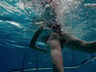Alla Birtakik undresses nude in the swimming_pool