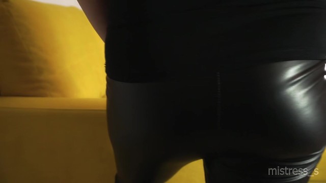 Mistress touch her tight ass and legs in leather leggings 2