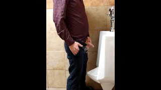 Pissing Peeing At The Urinal By A Ginger Businessman