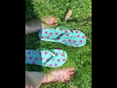 Cute feet playing in the grass