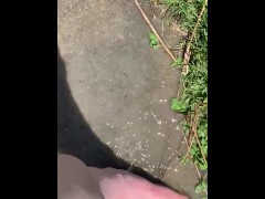 Feet playing in a puddle