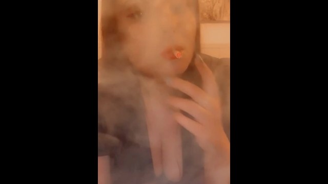 Smoking in a leather dress with red lipstick - full video on my onlyfans- link in bio & in comments 14