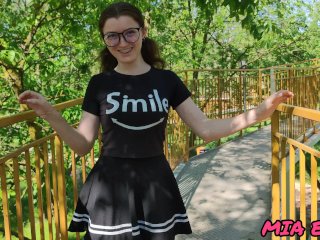 A Beautiful Girl With Glasses Walks And Seduces People In The Park With Her Look