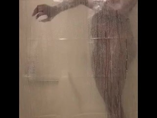 Hot Shower. Peaking on me showering through_my sheer curtains.