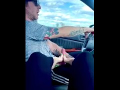 Giving daddy a footjob while he drives