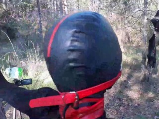 Tied to a tree on a sexy outfit, masked and_outdoor deepthroat withno mercy