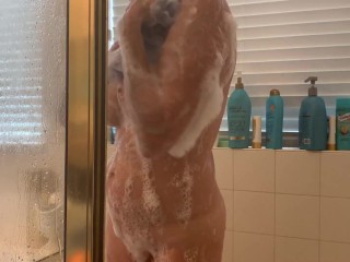 Wife soaping up in the_shower an rubbing her body_and clit
