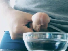 Thick cumshot into bowl