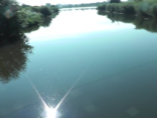 Messalina Dressed in Sun. Outside Outdoor. Nude Milf walks by bridge_River. Naturist Nudist_Woman