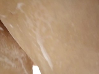 A mature bitch_takes a shower and sucks a dick, rubbing sperm on big_tits))