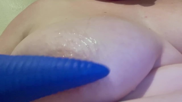 Tentacle dildo plays with my nipple