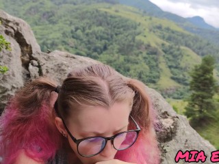 blowjob in the mountains from a girl in glasses with pinkhair cum on glasses and_face