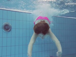 Pink swimswear babeLera showing naked body underwater