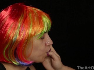 Screen Capture of Video Titled: Colorful Wig Facial!