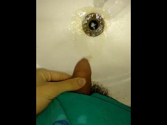 yellow piss in sink