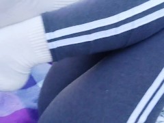 Such tempting feet!  Cutie outdoors in a public place with a beautiful ass and legs
