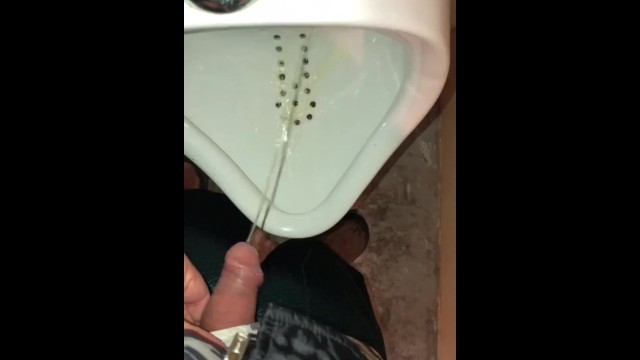 Girl Pissing into a Urinal & her Husband gets to Witness it first hand as he pisses right after her 15
