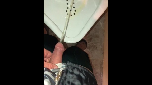 Girl Pissing into a Urinal & her Husband gets to Witness it first hand as he pisses right after her 15