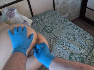 Fisting with medical gloves, milf with a_very hairy_pussy.